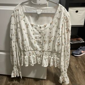 Arula white floral long sleeve peplum top. Never Worn Before.